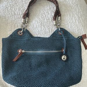 The Sak navy crochet bag with braided leather straps